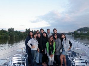 Students enjoying a boat ride after work