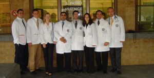 Students in front of Homolka Hospital